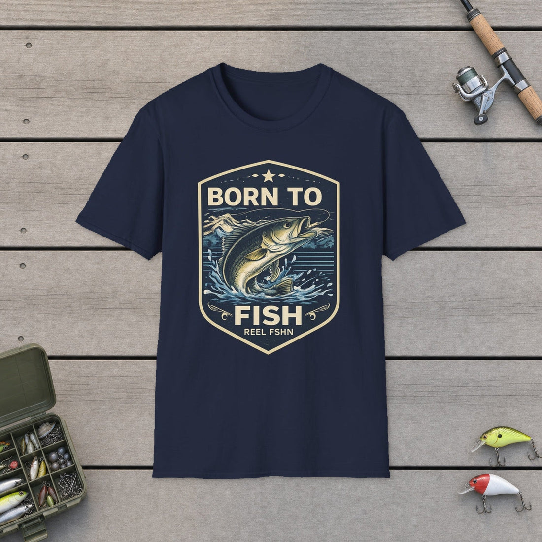 Born to Fish T-Shirt on a wooden dock with fishing rod, reel, and tackle box