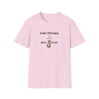 Pink Comfort Colors unisex t-shirt with "Lake Therapy" text and a fishing hook graphic.