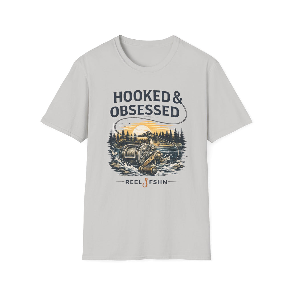 Light gray Comfort Colors unisex t-shirt with "Hooked & Obsessed" text and a fishing reel sunset graphic.