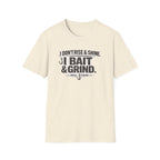 Comfort Colors unisex cream t-shirt with "I Don't Rise & Shine, I Bait & Grind" graphic and fishing hooks.