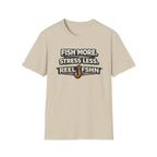 Comfort Colors unisex t-shirt in sand, featuring "FISH MORE. STRESS LESS. REEL FSHN" with a fishing hook graphic.