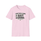 Pink Comfort Colors t-shirt with "I Don't Rise & Shine, I Bait & Grind" fishing graphic and hooks.