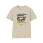 Comfort Colors tan t-shirt with "I THOUGHT ABOUT LEAVING... THEN IT BIT." text and a bass fishing graphic.