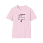 Pink Comfort Colors t-shirt with "Legends Start At Dawn." text and a fishing hook graphic.