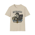 Beige Comfort Colors t-shirt with a skull wearing a fishing hat, holding a rod, and a bass. Text reads "FISH OR DIE REEL FSHN".