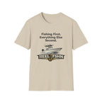 Comfort Colors unisex tee in sand, featuring a fishing boat graphic and "Fishing First. Everything Else Second. REEL FSHN" text.