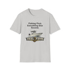 Light gray Comfort Colors cotton t-shirt with "Fishing First. Everything Else Second." text, a boat, and "REEL FSHN" logo.