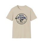 Reel FSHN T-Shirt in sand with a circular fishing logo featuring a reel, fish, and hook.