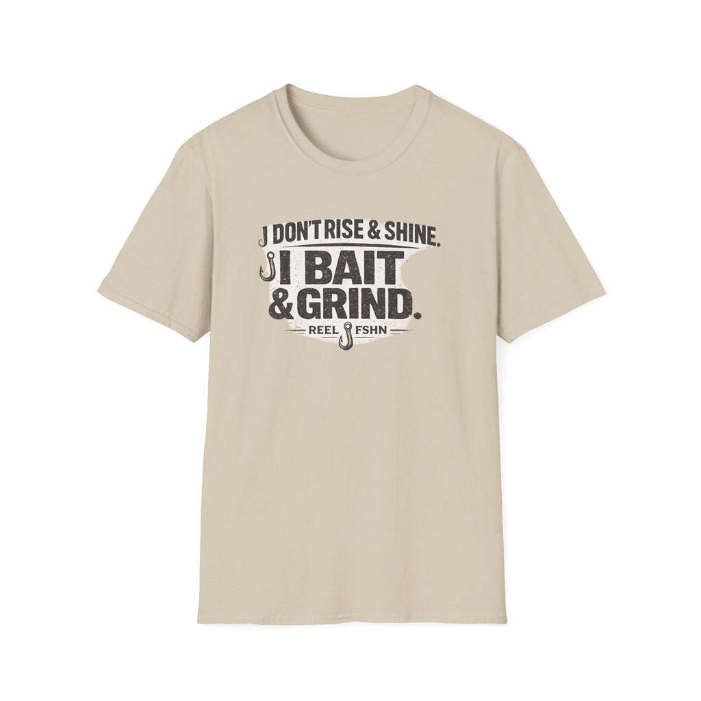Comfort Colors tan t-shirt with "I Don't Rise & Shine, I Bait & Grind" fishing graphic in black.