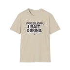 Comfort Colors tan t-shirt with "I Don't Rise & Shine, I Bait & Grind" fishing graphic in black.