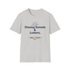 Light gray Comfort Colors unisex tee with "Chasing Sunsets & Lunkers" and a fishing hook graphic.