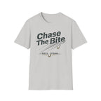 Light gray Comfort Colors unisex t-shirt with "Chase The Bite" and fishing hook graphic.