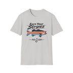 Light gray Comfort Colors t-shirt with "Earn Your Stripes" text, a striped bass graphic, and "REEL FSHN" with a fishing hook.