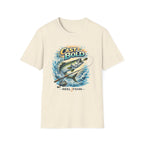 Unisex "Cast Bold" Comfort Colors t-shirt in natural, featuring a vibrant graphic of a tarpon jumping with a fishing rod.