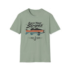 Sage green Comfort Colors t-shirt with "Earn Your Stripes" text, a bass graphic with orange and blue stripes, and a fishing hook.