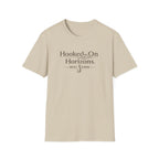 Unisex Comfort Colors tee in sand, featuring "Hooked On Horizons. REEL ESHN" graphic with a fishing hook.