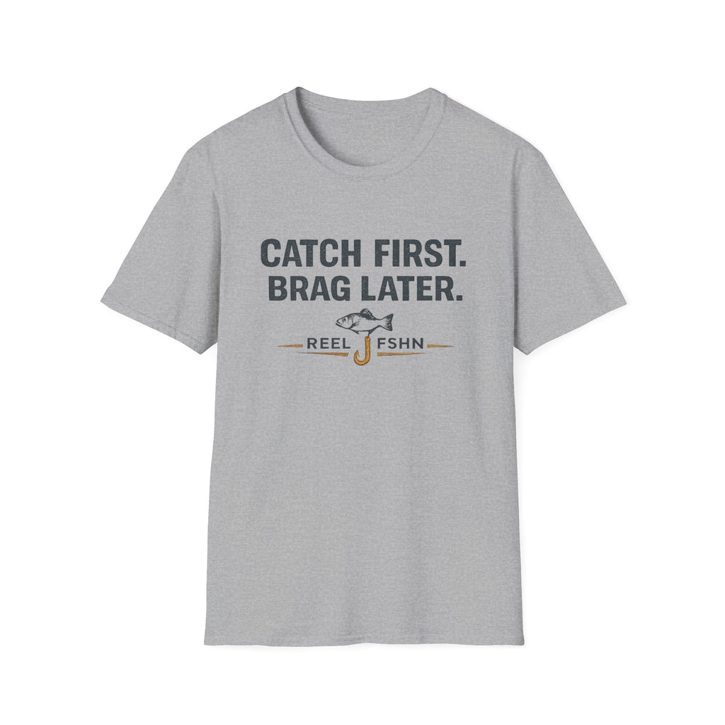 Gray Comfort Colors unisex t-shirt with "Catch First. Brag Later." text and a fishing hook graphic.