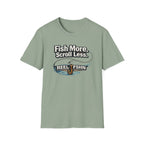 Sage green Comfort Colors t-shirt with "Fish More. Scroll Less." text and a fishing lure graphic.