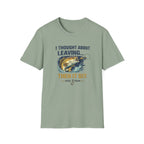 Sage green Comfort Colors t-shirt with "I Thought About Leaving... Then It Bit." text and a bass fishing graphic.