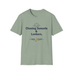 Unisex Comfort Colors sage green t-shirt with "Chasing Sunsets & Lunkers" graphic and fishing hook.