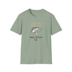 Sage green unisex Comfort Colors t-shirt with "Just One More Cast" text, a bass, and "REEL FSHN" on a fishing hook.