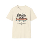 Comfort Colors "Earn Your Stripes" t-shirt in natural, featuring a bass graphic with orange and blue stripes, and a fishing hook.
