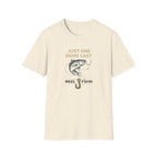 Comfort Colors cream t-shirt with "Just One More Cast" text, a bass on a fishing line, and "REEL FSHN" with a hook.
