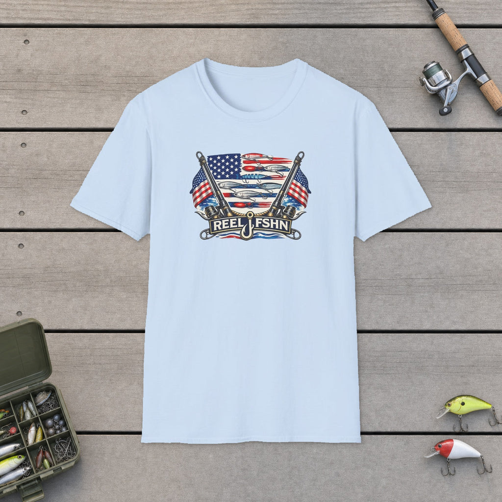 American Flag with Two Rods T-Shirt flat-laid on wooden dock boards beside a fishing rod and tackle box