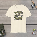 Backwater Bandit T-Shirt on a wooden dock with fishing rod, reel, tackle box and lures