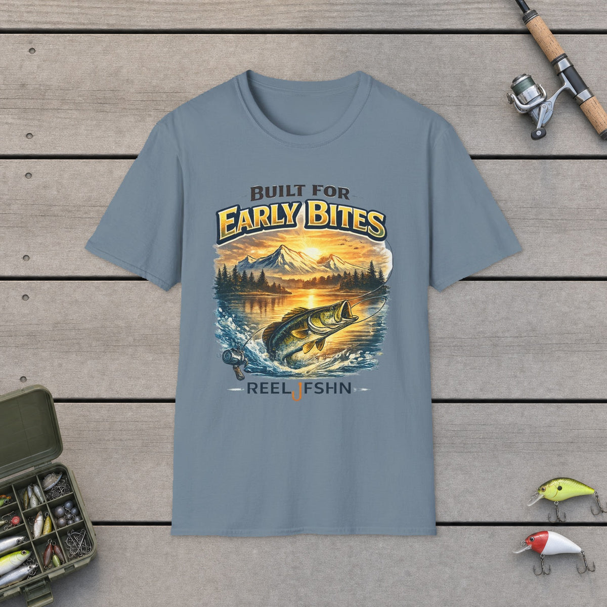 "Built for Early Bites" T-Shirt on a wooden dock with fishing rod, reel, tackle box and lures