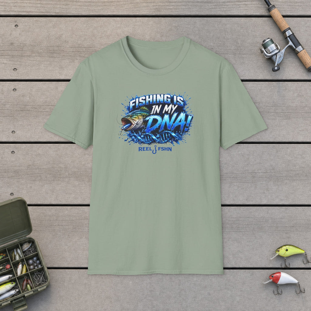 Fishing Is In My DNA with Bass T-Shirt flat-laid on wooden dock boards beside a fishing rod and tackle box