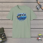 Fishing Is In My DNA with Bass T-Shirt on a wooden dock with fishing rod, reel, tackle box and lures