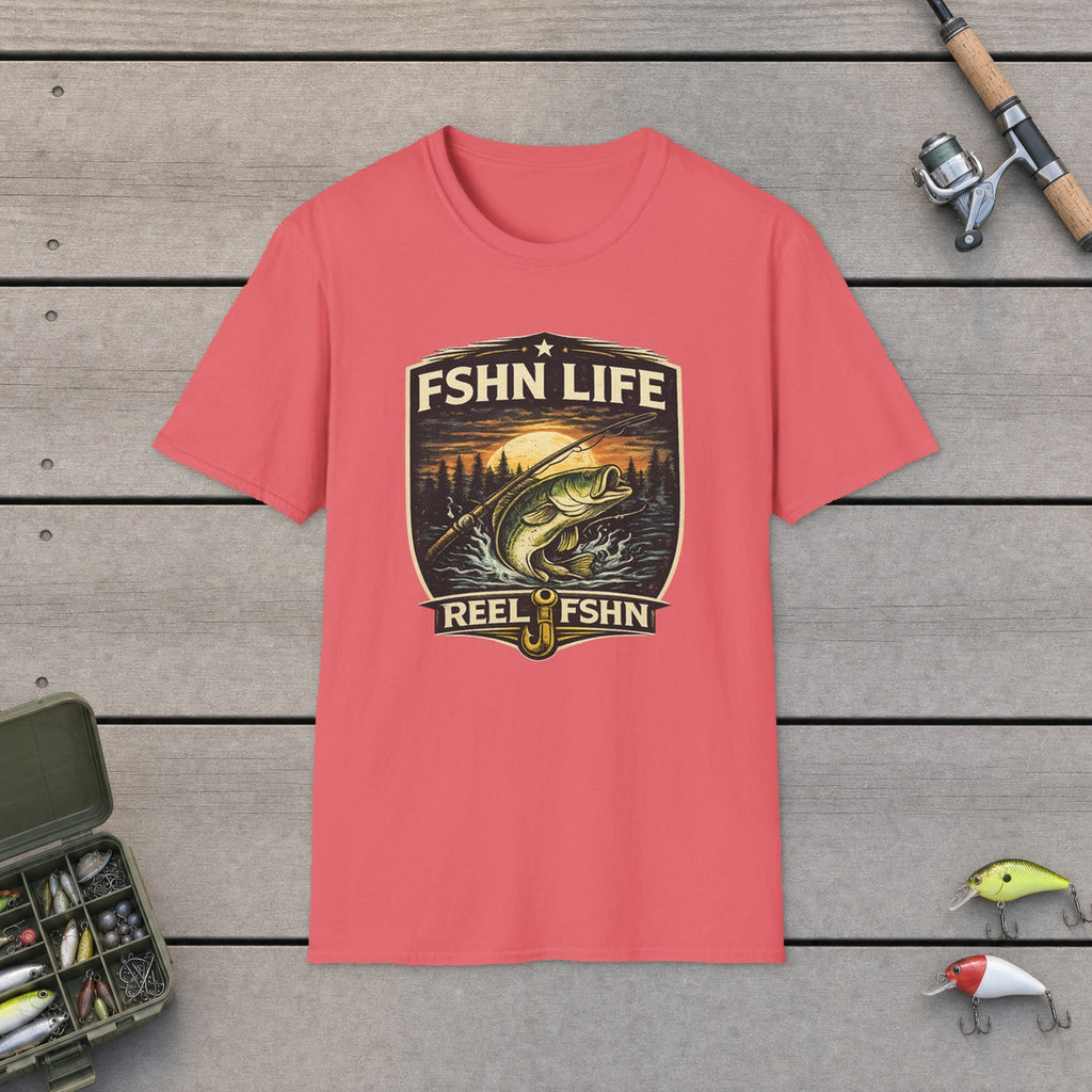 FSHN Life T-Shirt flat-laid on wooden dock boards beside a fishing rod and tackle box