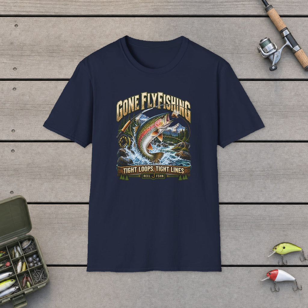 Gone Fly Fishing T-Shirt flat-laid on wooden dock boards beside a fishing rod and tackle box
