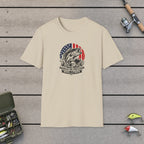 Hooked On Freedom T-Shirt on a wooden dock with fishing rod, reel, tackle box and lures