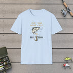 Just One More Cast  T-Shirt on a wooden dock with fishing rod, reel, tackle box and lures