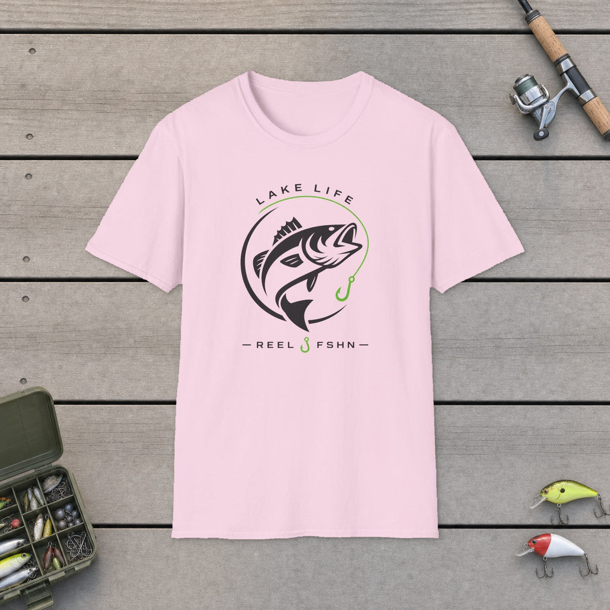 Lake Life T-Shirt on a wooden dock with fishing rod, reel, tackle box and lures