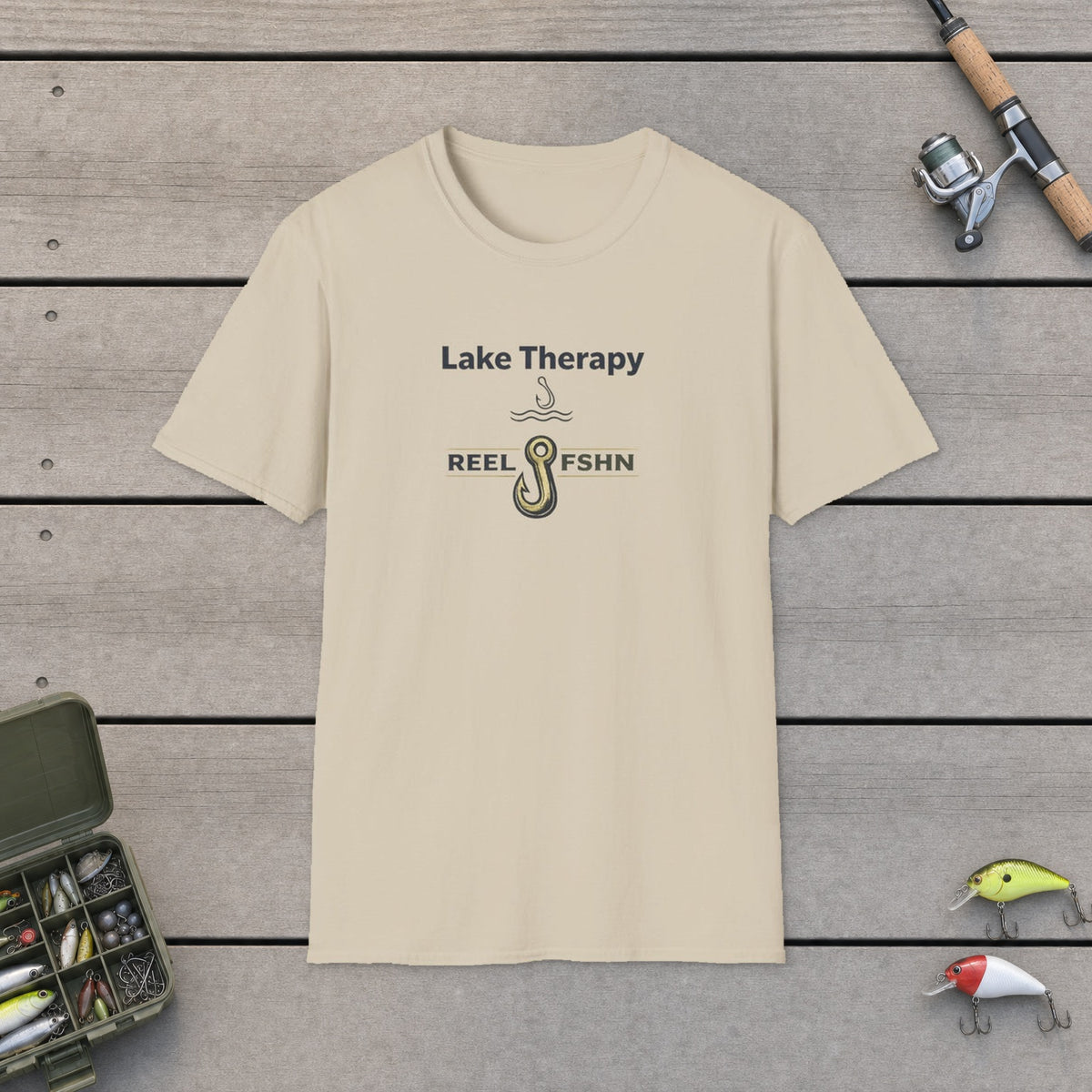 Lake Therapy  T-Shirt on a wooden dock with fishing rod, reel, tackle box and lures