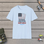 Land Of The Free Home Of The Brave Angler T-Shirt on a wooden dock with fishing rod, reel, tackle box and lures
