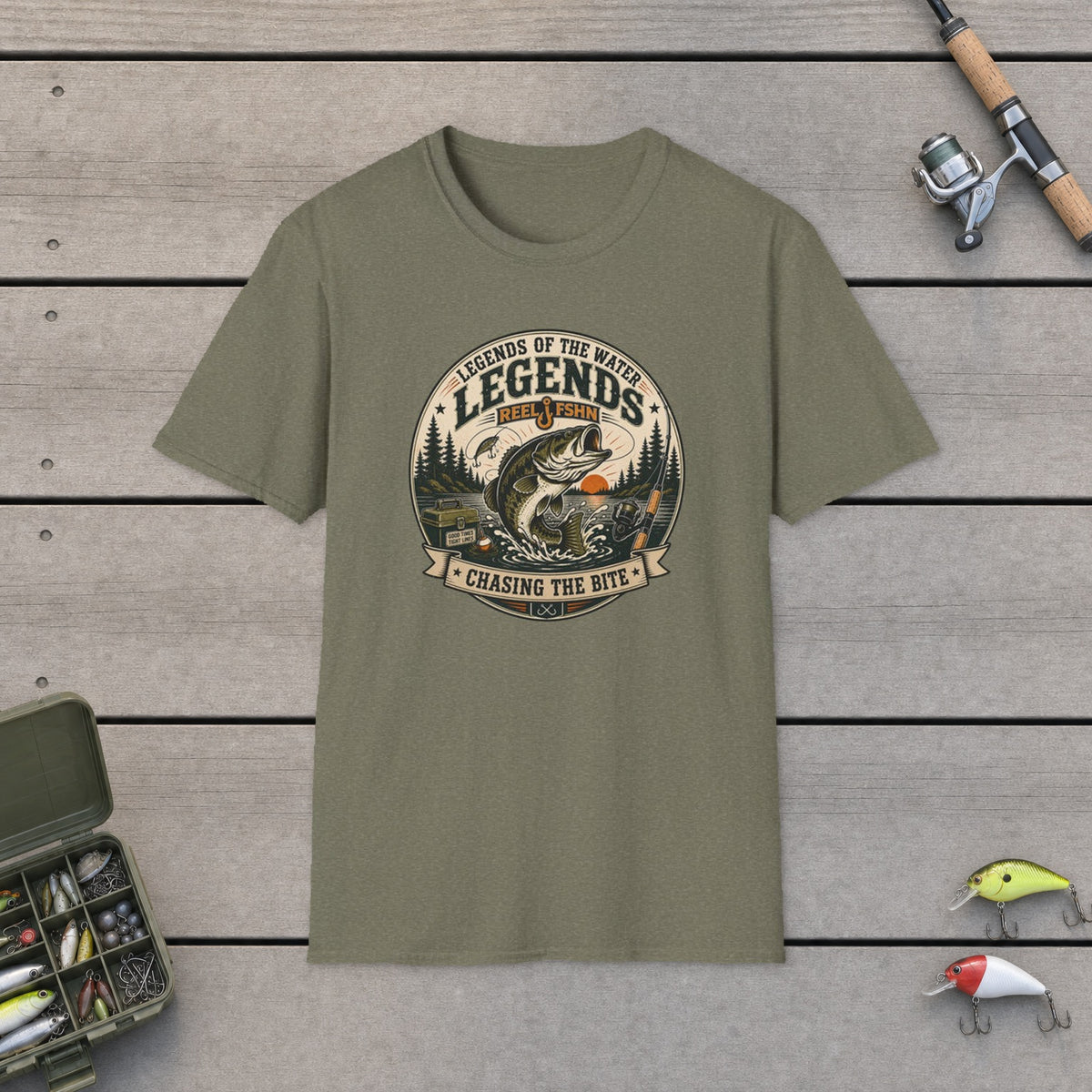Legends Of The Water T-Shirt on a wooden dock with fishing rod, reel, tackle box and lures