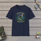Night Fishing  T-Shirt on a wooden dock with fishing rod, reel, tackle box and lures