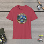 Not All Who Wander Are Lost T-Shirt on a wooden dock with fishing rod, reel, tackle box and lures