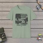 Passion For Fishing Black Print T-Shirt on a wooden dock with fishing rod, reel, tackle box and lures