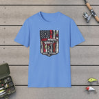 Red, White, Bite! T-Shirt on a wooden dock with fishing rod, reel, tackle box and lures