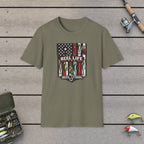 REEL Life! T-Shirt on a wooden dock with fishing rod, reel, tackle box and lures