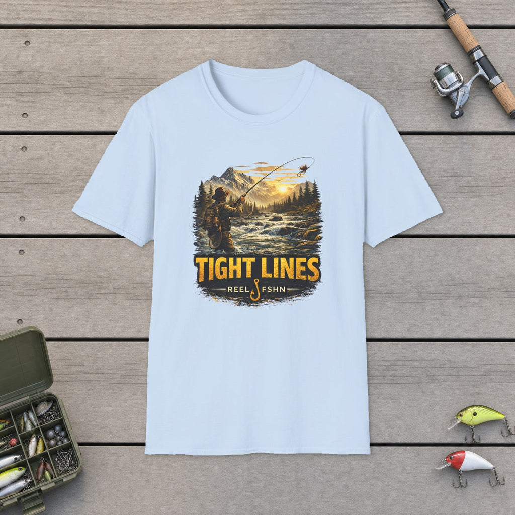 Tight Lines T-Shirt flat-laid on wooden dock boards beside a fishing rod and tackle box