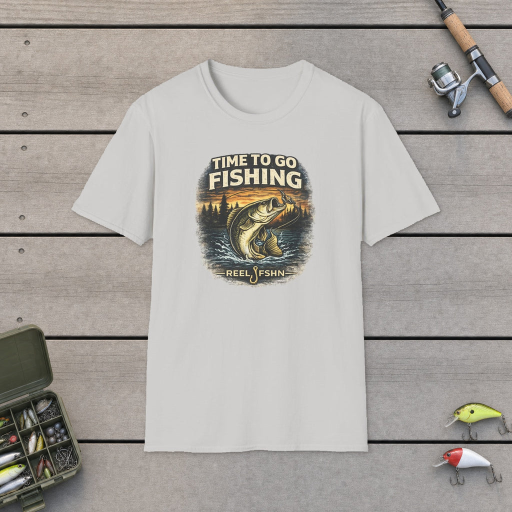 Time To Go Fishing T-Shirt flat-laid on wooden dock boards beside a fishing rod and tackle box
