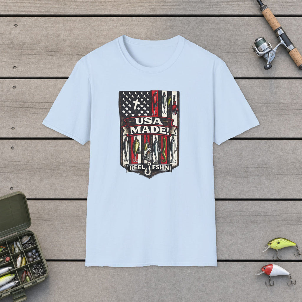 USA MADE! T-Shirt flat-laid on wooden dock boards beside a fishing rod and tackle box